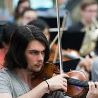 Symphony musician playing violin