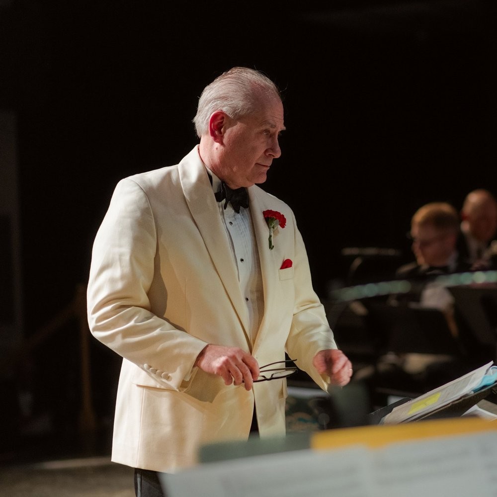 Music Director conducting the orchestra