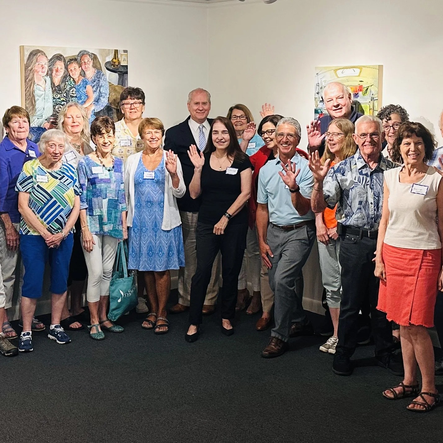 Group of smiling Glens Falls Symphony volunteers